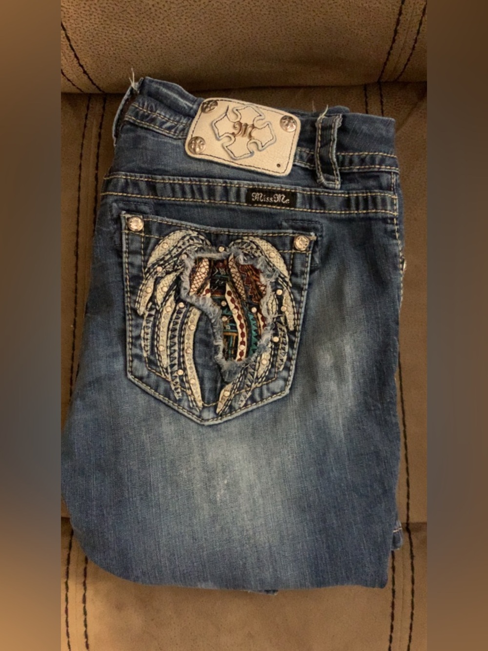 Miss Me Distressed Blue Bootcut Jeans with Embroidered Wing Pocket